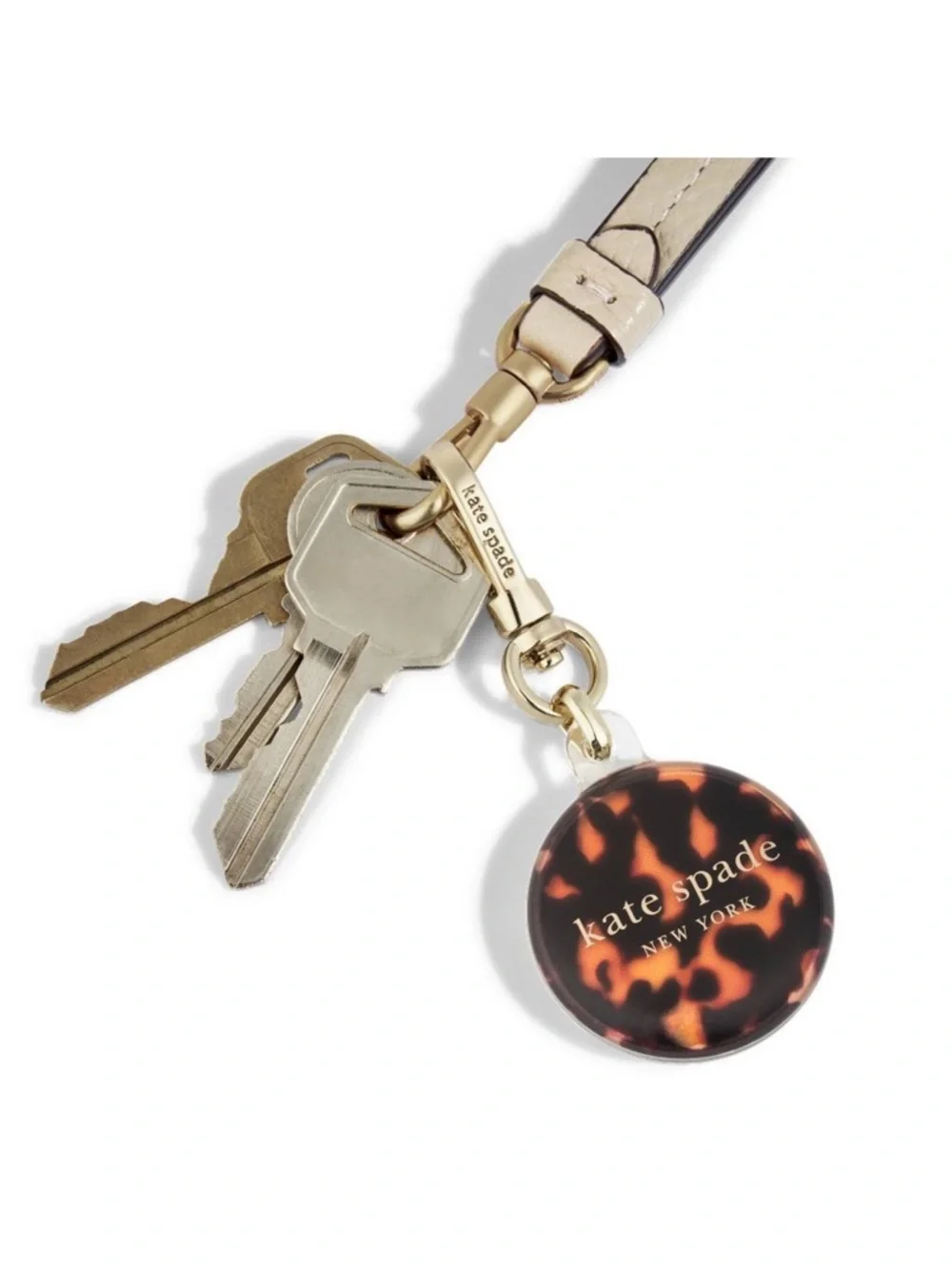 Kate Spade Tortoiseshell Round AirTag Holder with Gold Hardware